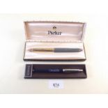 A Parker 51 pen boxed and another Parker pen