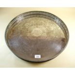 A large silver plated engraved circular tray - 49cm