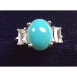 A 9k gold ring set turquoise and white zircon, size P