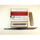 A part box of Clements 'Fine Red Hexagonal Pencils', a giant size dip pen and a folding Rabone rule