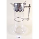A silver plated Christopher Dresser style claret jug with etched glass