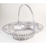 A Georgian silver cake basket by Richard Mills - London 1773