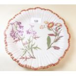 A Royal Worcester floral painted plate on ivory ground