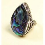 A large silver ring set abalone shell