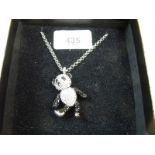 A Butler and Wilson Panda pendant on chain
