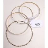 A set of four various 9 carat gold bangles 18g