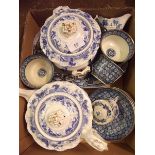 A collection of blue and white dinner and tea ware items to include a matching floral teapot and two