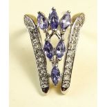 A silver ring set tanzanite