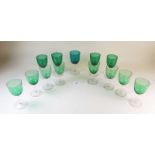 A collection of various green liqueur glasses