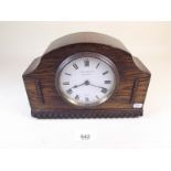 A Swiss 'Buren' mantle clock in oak surround