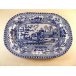 A blue and white Pearlware meat platter in unknown chinoiserie design c.1820