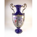 A Victorian two handled vase with printed decoration in the style of Angelica Kaufman