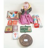 A box of various vintage games including a Will's Woodbine cricket game, and a German doll