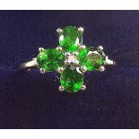 A 9k gold ring set diopside and chip diamonds, size P