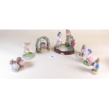 A group of seven Border Fine Arts Beatrix Potter figures: The Tale of Jemima Puddleduck on wooden