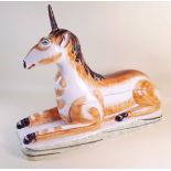 A large Royal Staffordshire style Unicorn form dish, horn a/f - 45cm long