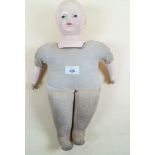 An Effanbee composition soft body doll with moulded head and arms