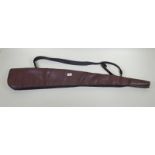 A single gun slip of fine quality leather with fleece lining and block ends