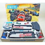 A Scalextric 'Grand Prix 75' model racing set boxed BRM and Cooper cars, Pit Stop set and