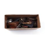 Box containing assorted gun related equipment: cleaning rods, wad punches, oil bottles, moulds, etc