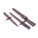 Two knife bayonets (one with fitted scabbard) n.b. rust and pitting throughout