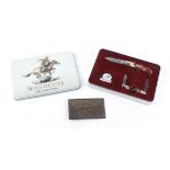 Winchester 2004 Limited Edition penknife set, in presentation tin; Winchester Repeating Arms belt