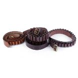 Four leather cartridge belts