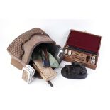 Cased 12 bore presentation cleaning kit; Game bag with quantity of gun cleaning materials, hand
