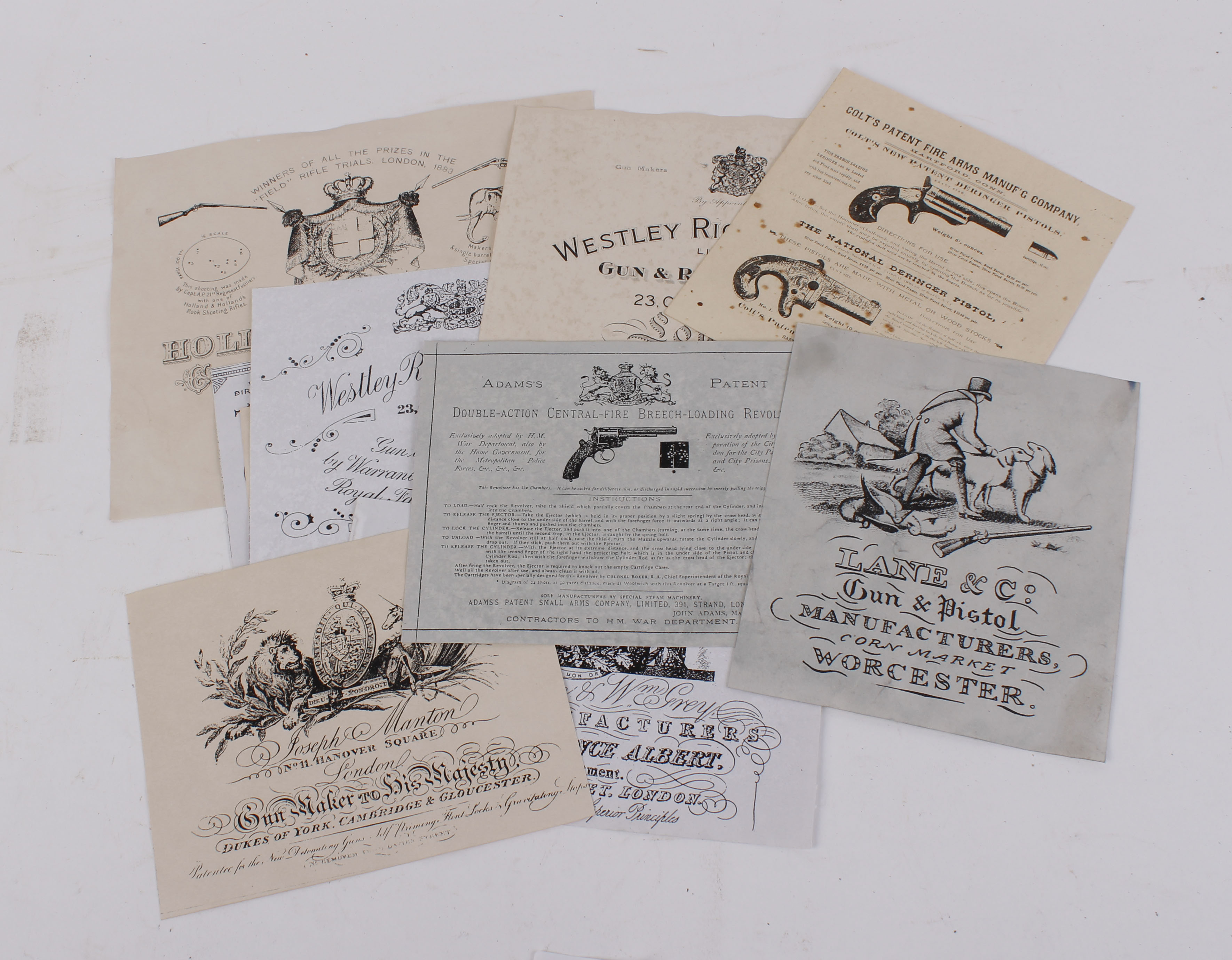 Twelve reproduction trade labels: Wm Moore & Grey; Joseph Manton; Westley Richards & Co.; Colt's;