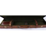Brown vinyl covered gun case, fitted interior for 30 ins barrels