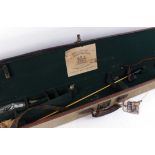 Tan canvas rifle case, green baize lined fitted interior 47 ins overall, John Rigby & Co. trade