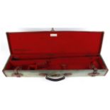Brady canvas and leather gun case, red baize lined fitted interior for 30 ins barrels