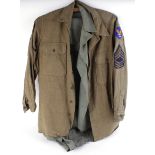 Green military style shirt and trousers; Khaki military jacket with sewn badges
