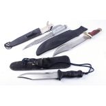Three various survival knives, each with clipped saw backed blades and sheathed (3)