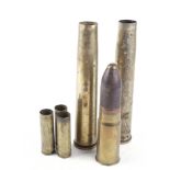 Six various brass shell cases