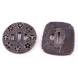 Two Japanese Tsuba: signed circular bronze tsuba decorated with branches and 8 pierced and fretted