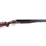 S2 12 bore Browning 325 over and under, ejector, 30 ins multi choke barrels, broad ventilated rib,