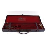 Leather gun case with fitted interior for up to 30 ins barrels, Cogswell & Harrison trade label