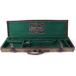 Canvas and leather gun case, green baize lined fitted interior for 30 ins barrels, Charles Hellis