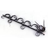 18thC blacksmith made five position iron gun rack, with iron securing loops and locking hasp