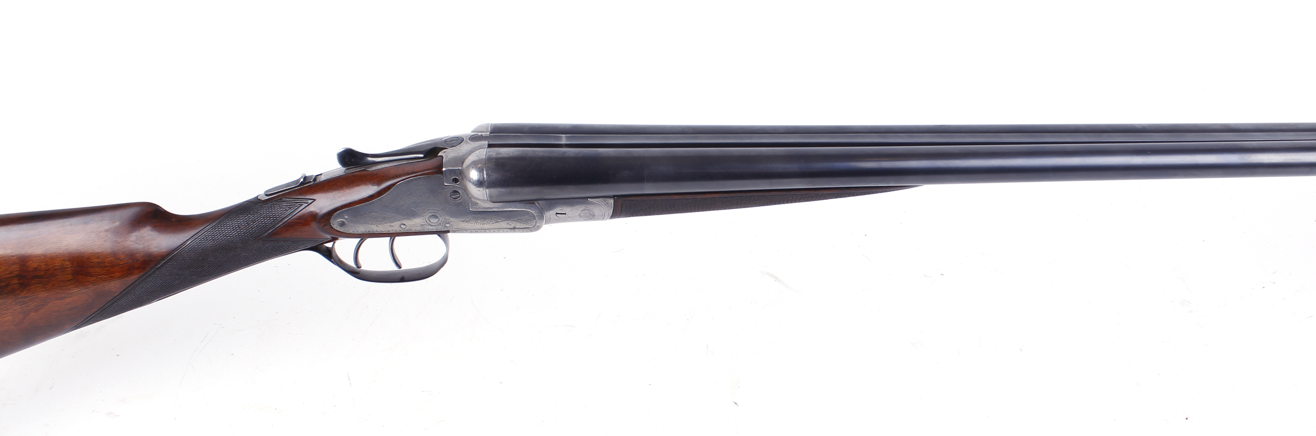 S2 12 bore sidelock non ejector, English, 28 ins sleeved barrels, ic & ¼, the top rib inscribed R.