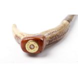 Holly shooting stick, horn handle with wood mounted inset Purdey cartridge head stamp, magnetic
