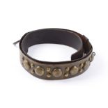 Victorian leather and brass dog collar, the pattered studded brass outer ring inscribed Miss C.