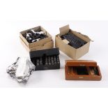 Box containing quantity of rifle/shotgun butt plates, 4 pairs scope mounts, rifle stands, Parker