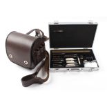 Brown leather cartridge bag with aluminium cased cleaning kit, various bore sizes