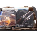 Two boxes of various shooting books and catalogues