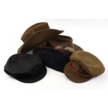 Two Australian military style bush hats and three other military caps