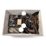 Tray of various gun parts: locks, sights, hammers, dies, etc