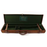 Canvas and leather gun case, green baize lined fitted interior for 28 ins barrels (will take 30