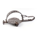 Victorian man trap, the drilled steel pressure plate beneath iron jaws, length 26 ins overall